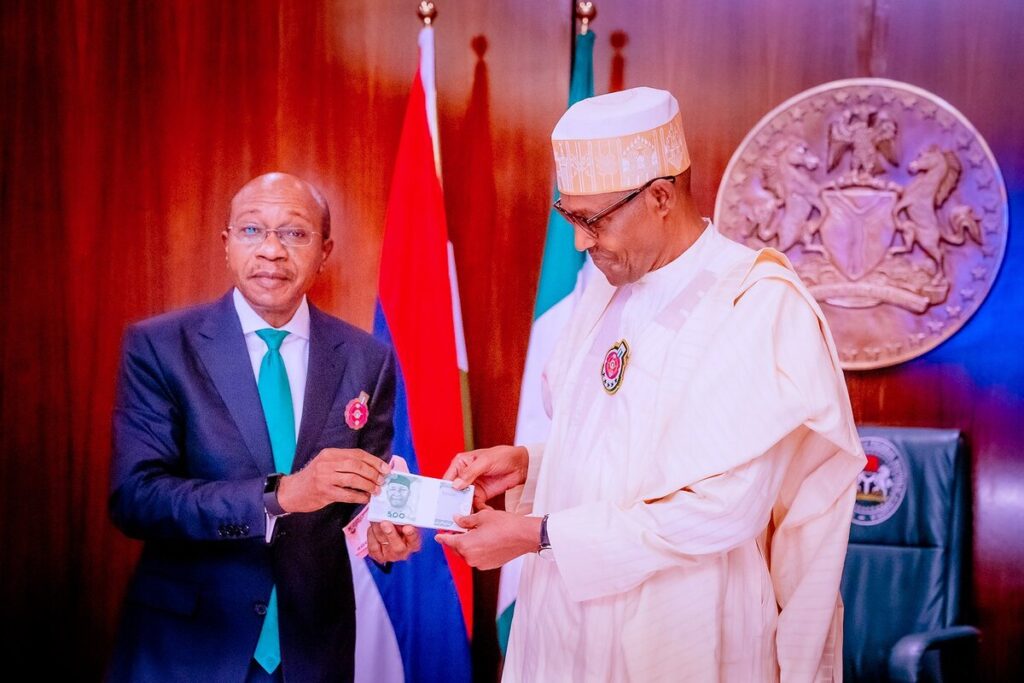 cbn_governor_and_president_buhari_launch_new_naira_notes_in_abuja