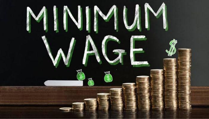a photo to express the monthly minimum wage paid to workers