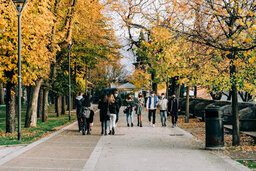 a_group_of_student_on_the_walkway_on_a_university_campus