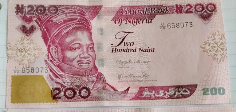 The photo shows Nigerian 200 Naira note