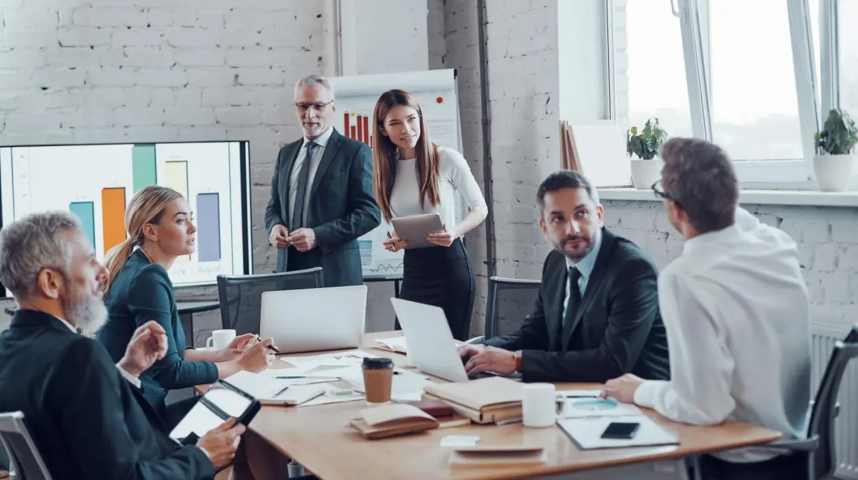 photo shows business advisory board at a meeting brainstorming business ideas